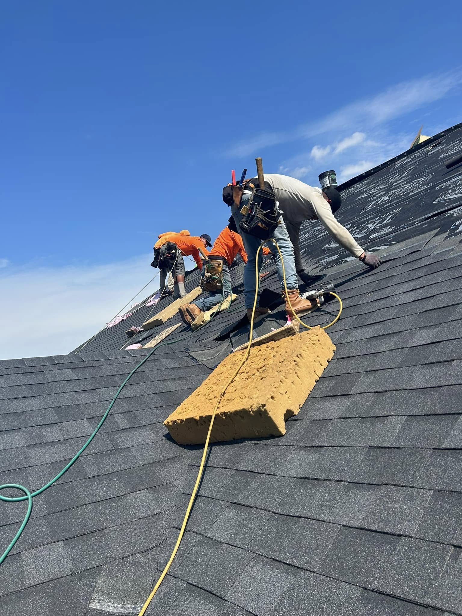 Roofer installing shingles on residential roof Sedalia, MO – Colgan’s Roofing